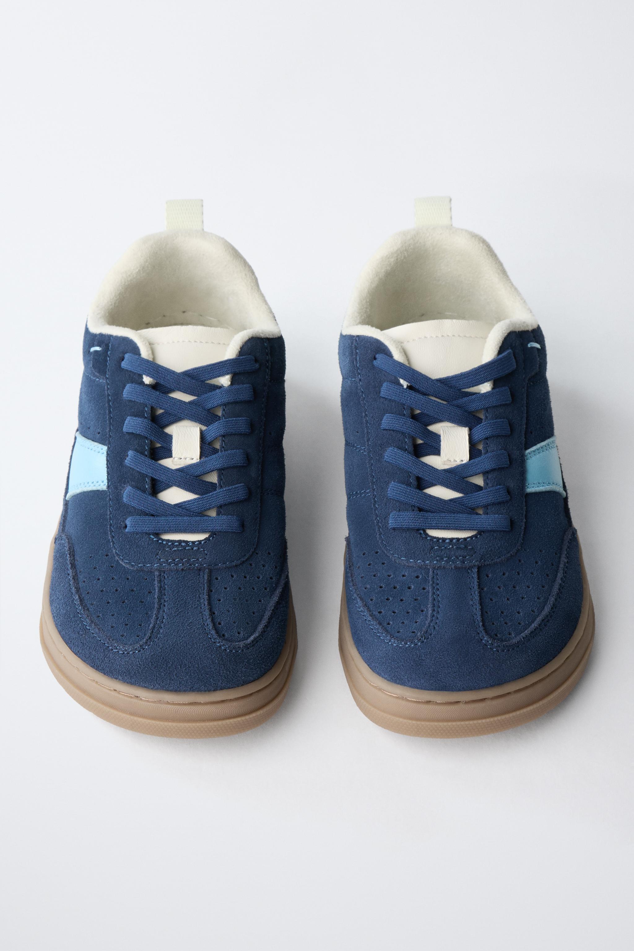 TENNIS EN CUIR PIEDS NUS